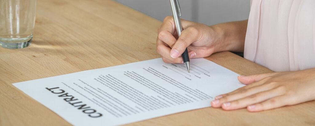 A person signing a work contract